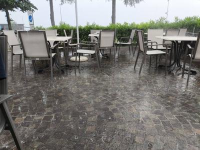 Nago-Torbole, Trentino, Italy - July 21, 2025: Storm on Lake Garda with extreme rainfall and thunderstorms. Heavy rainfa-stock-foto