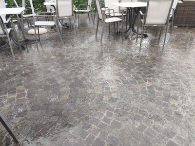 Nago-Torbole, Trentino, Italy - July 21, 2025: Storm on Lake Garda with extreme rainfall and thunderstorms. Heavy rainfa-stock-foto
