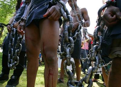 People take part during a protest and celebration of the Reminding Abolition of Slavery Day on July-stock-foto