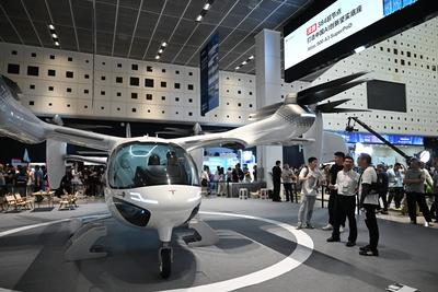 SHANGHAI, CHINA - JULY 26: An electric vertical take-off-and-landing (eVTOL) aircraft is displayed at the exhibition are-stock-foto