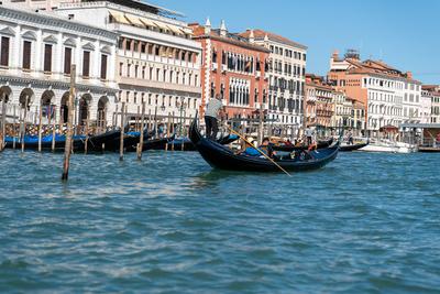 Venice, Italy - September 12, 2022: A small canal in Venice with tourists and gondolas *** Ein kleiner Kanal in Venedig-stock-foto