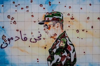 Almost all military bases and schools across Syria holds wall graffitis of the country s familyhood-stock-foto