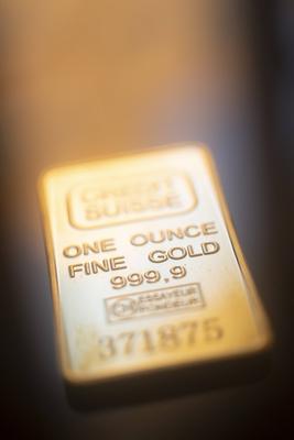 Gold bullion ingot bar Solid pure 999.9 gold bullion ingot bars photo. Copyright: xZoonar.com/EdwardxOlivex 17730624-stock-foto