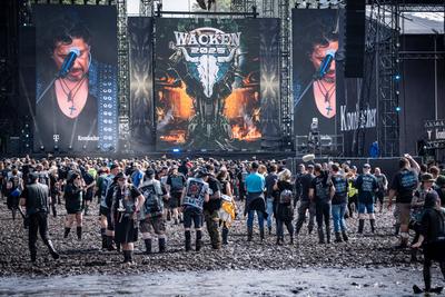 Wacken Open Air - Festival 2025 - WOA - W:O:A 2025 - Blick auf das Festivalgel?nde - Masch und Schlamm im Infield des Festivals-stock-foto