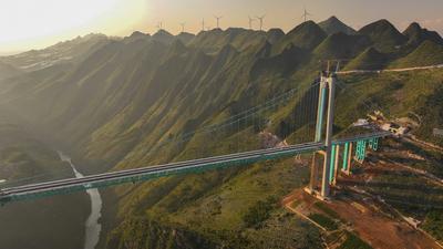 QIANXINAN, CHINA - AUGUST 02: Aerial view of a construction site of the Huajiang Grand Canyon Bridge on August 2, 2025 i-stock-foto