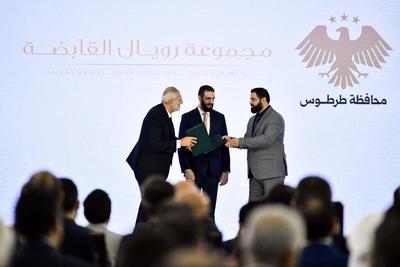 Syrian President Ahmad al-Sharaa attends the signing of investment memoranda of understanding covering a number of strategic projects-stock-foto