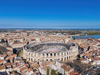 Cityscape of Arles with Amphitheatre and Rhone River visible from above.-stock-foto