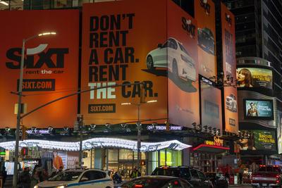 Sixt car rental advertising in New York A billboard advertising the Sixt car rental in Times Square in New York on Wedne-stock-foto