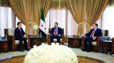 Syrian Minister of Foreign Affairs and Expatriates, Asaad al-Shaibani, meets with the Director-General of the Islamic World Educational, Scientific and Cultural Organization (ICESCO), Salim bin Mohammed al-Malik-stock-foto