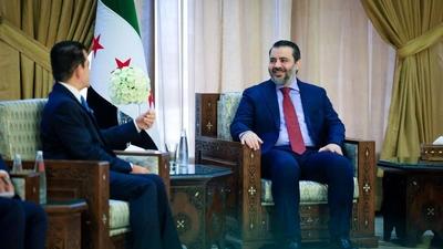 Syrian Minister of Foreign Affairs and Expatriates, Asaad al-Shaibani, meets with the Director-General of the Islamic World Educational, Scientific and Cultural Organization (ICESCO), Salim bin Mohammed al-Malik-stock-foto
