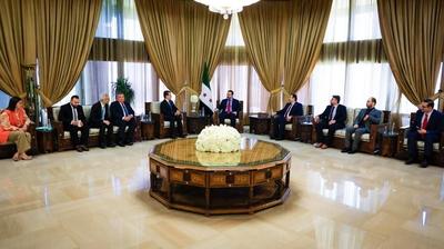 Syrian Minister of Foreign Affairs and Expatriates, Asaad al-Shaibani, meets with the Director-General of the Islamic World Educational, Scientific and Cultural Organization (ICESCO), Salim bin Mohammed al-Malik-stock-foto