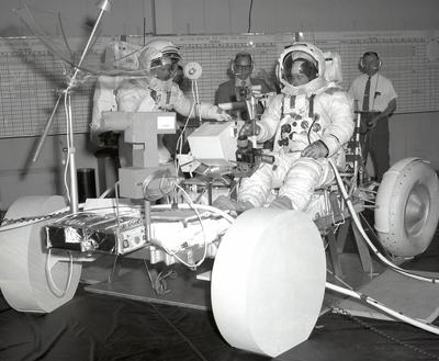 This image depicts the Apollo 16 mission astronauts John Young (right) and Charles Duke (left) in pressure suits during-stock-foto