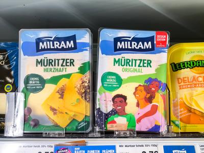 Bavaria, Germany - August 19, 2025: Milram M?ritzer cheese in the refrigerated section of a food supermarket. Old and ne-stock-foto