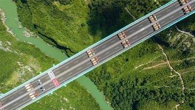 QIANNAN, CHINA - AUGUST 25: Aerial view of a load test on the Huajiang Grand Canyon Bridge on August 25, 2025 in Qiannan-stock-foto