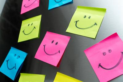 Germany - September 27, 2025: Colorful Post-it notes with smiling faces symbolize positive feelings. *** Bunte Post-its-stock-foto