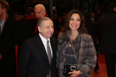 Jean Todt and actress Michelle Yeoh attend the premiere of The Monuments Men during the 64th International Berlin Film F-stock-foto