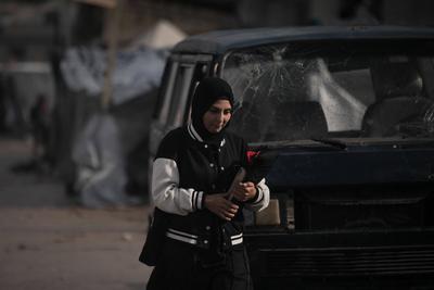 Gaza University Students Head to Their Campuses Despite Heavy Rain and Winter Weather-stock-foto