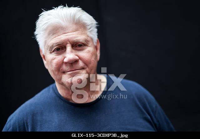 Hamburg, Germany. 14th Aug, 2025. Carsten Marek, owner of the pub 'Zur Ritze', stands in front of his pub with a boxing ring on the Reeperbahn during a photo shoot. Marek is a former St Pauli Red Light great and was the boss of the infamous 'Hamburger Jungs', who dominated the sex business on the Kiez in the early 2000s. Credit: Christian Charisius/dpa/Alamy Live News