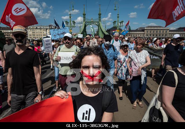 Budapest, Budapest, Hungary. 1st June, 2025. ENIKO TOTH, campaigner with the 'aHang' movement is marching with her mouth taped to protest the Hungarian goverment's new legistlation often called the 'censorship law.' Credit: Daniel Alfoldi/ZUMA Wire/Alamy Live News