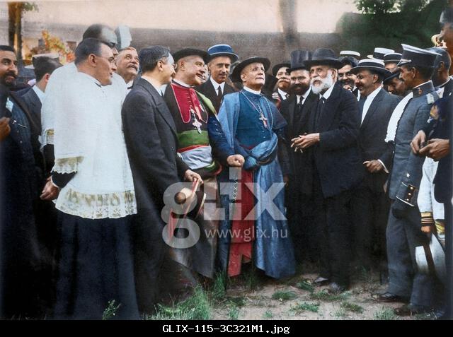 Art Nouveau architect Antoni Gaudí i Cornet (1852-1926) shows the work on the Sagrada Familia to Cardinal Francesco Ragonesi, Vatican Nuncio under Benedict XV, accompanied by the Bishop of Barcelona, Rey i Casanovas. Photograph, Barcelona, July 2, 1915. Later coloring -