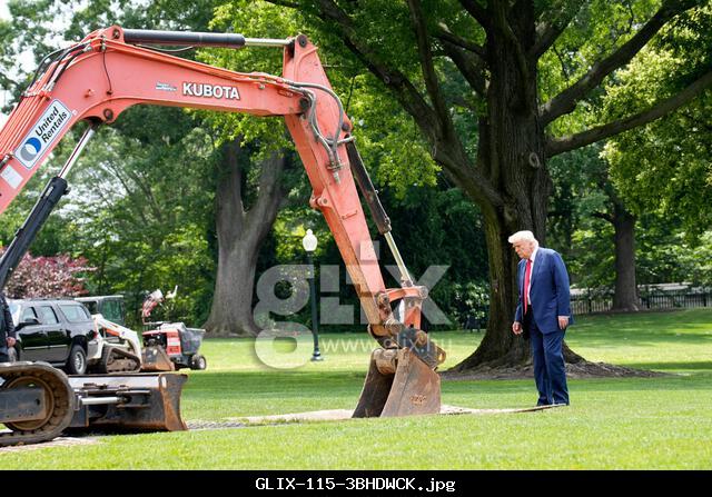Washington, United States. 09th June, 2025. US President Donald Trump looks at an excavator on the South Lawn as he returns to the White House from Camp David in Washington on June 9, 2025. Photo by Yuri Gripas/ABACAPRESS.COM Credit: Abaca Press/Alamy Live News