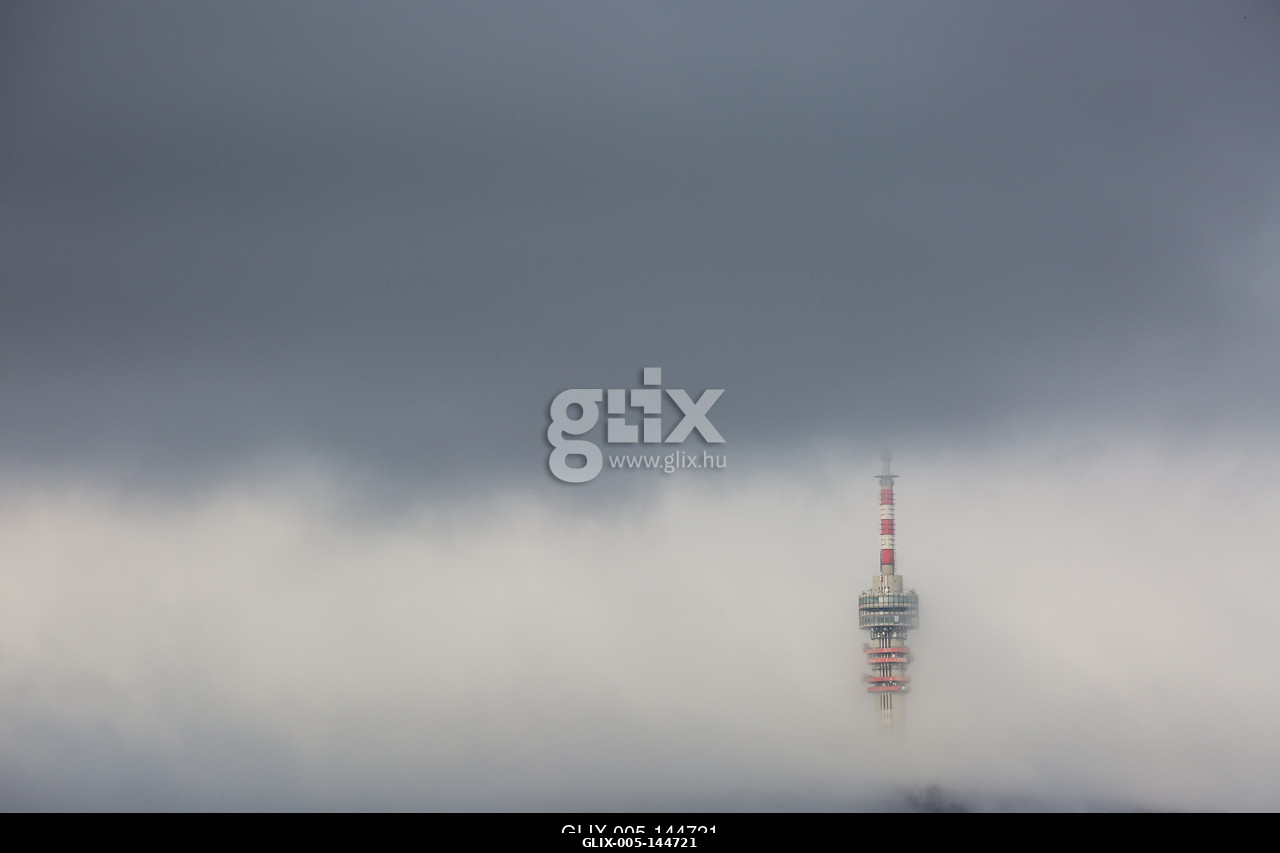 Telecommunication Tower in foggy and cloudy sky.A pécsi Tv-torony és Kilátó Magyarország legmagasabb épülete. A 197 méter magas  épület a Mecsek 53...