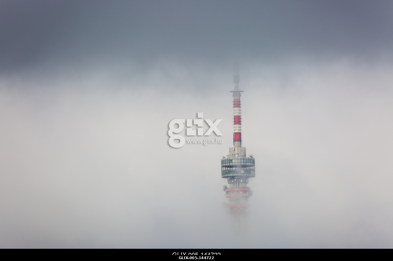 Telecommunication Tower in foggy and cloudy sky.A pécsi Tv-torony és Kilátó Magyarország legmagasabb épülete. A 197 méter magas  épület a Mecsek 53...