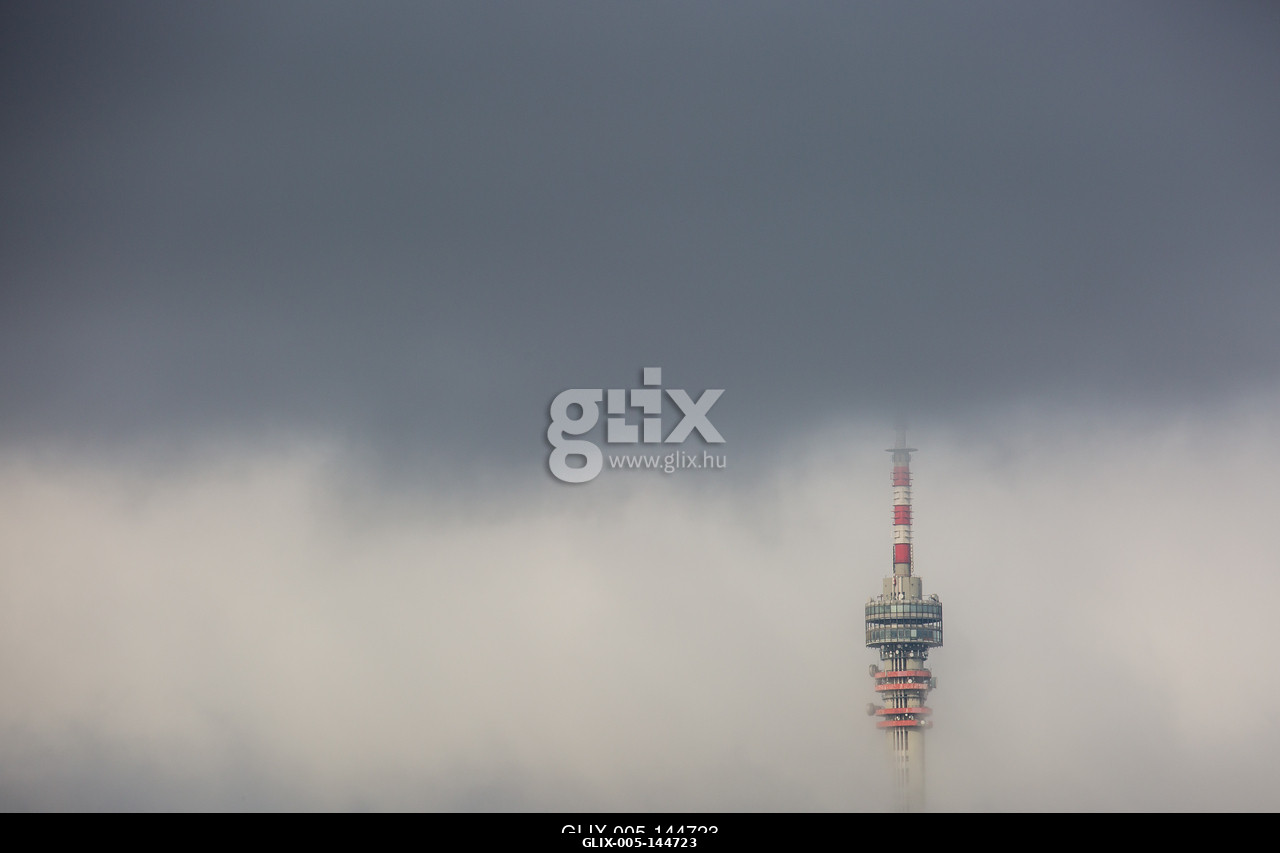Telecommunication Tower in foggy and cloudy sky.A pécsi Tv-torony és Kilátó Magyarország legmagasabb épülete. A 197 méter magas  épület a Mecsek 53...