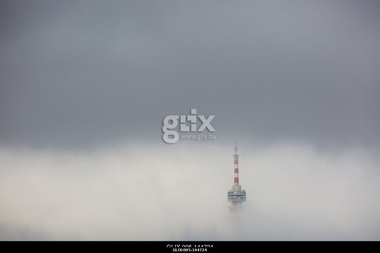 Telecommunication Tower in foggy and cloudy sky.A pécsi Tv-torony és Kilátó Magyarország legmagasabb épülete. A 197 méter magas  épület a Mecsek 53...