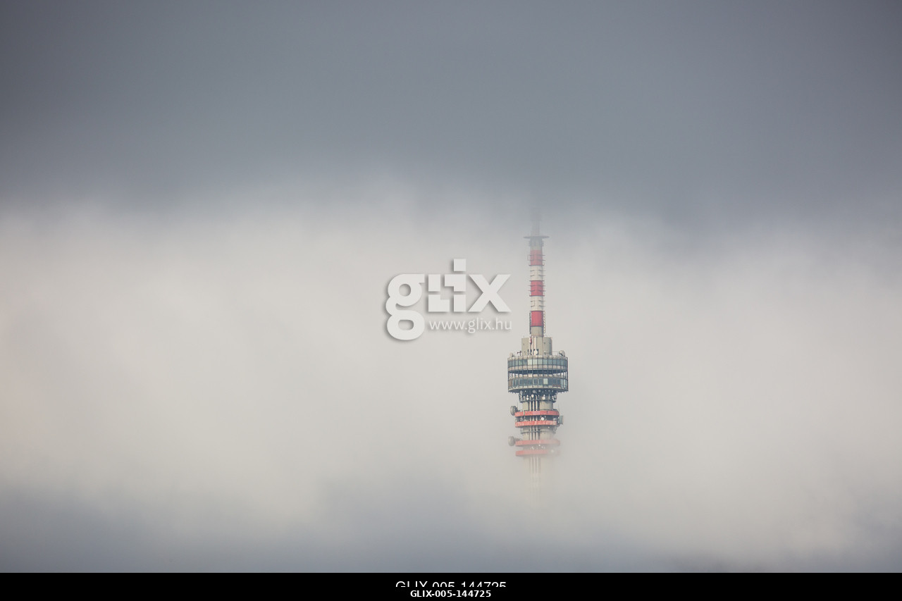 Telecommunication Tower in foggy and cloudy sky.A pécsi Tv-torony és Kilátó Magyarország legmagasabb épülete. A 197 méter magas  épület a Mecsek 53...