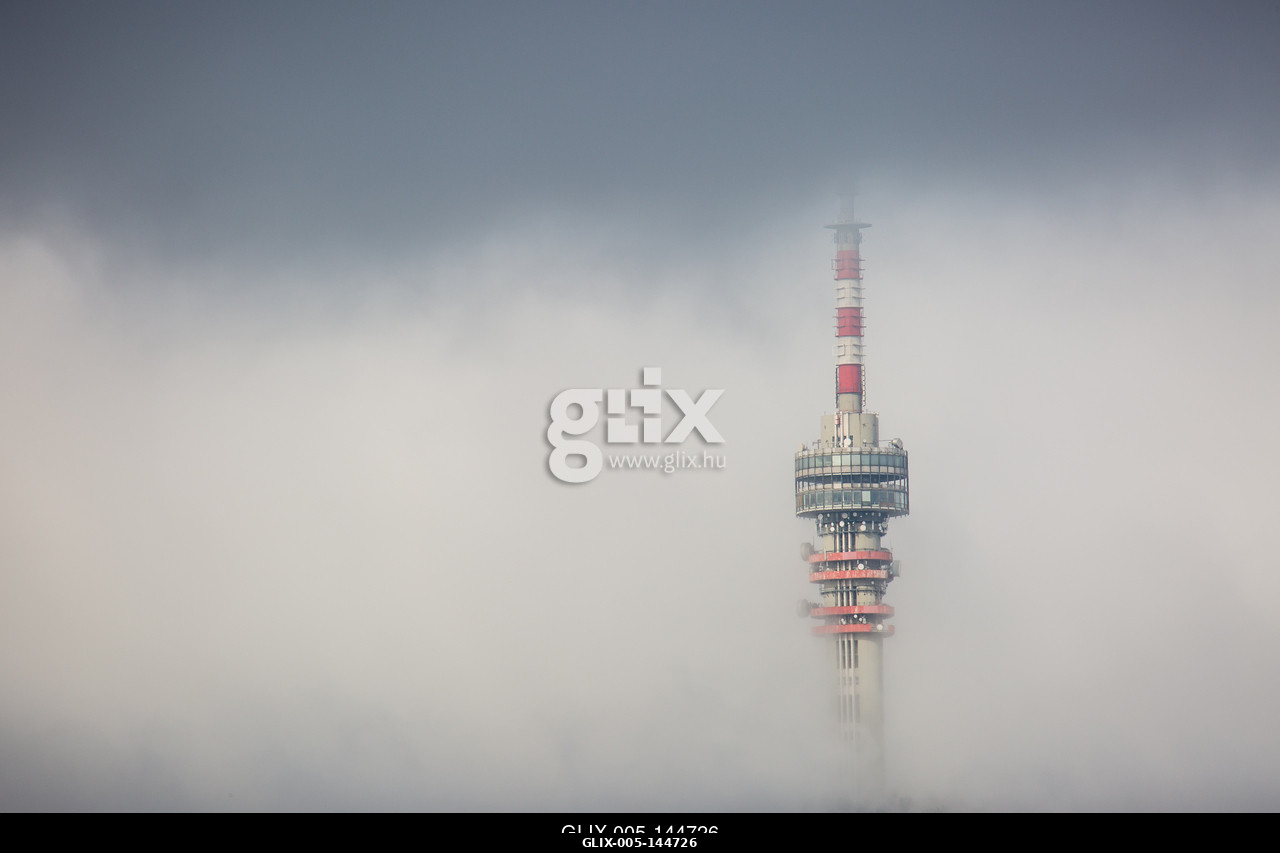 Telecommunication Tower in foggy and cloudy sky.A pécsi Tv-torony és Kilátó Magyarország legmagasabb épülete. A 197 méter magas  épület a Mecsek 53...
