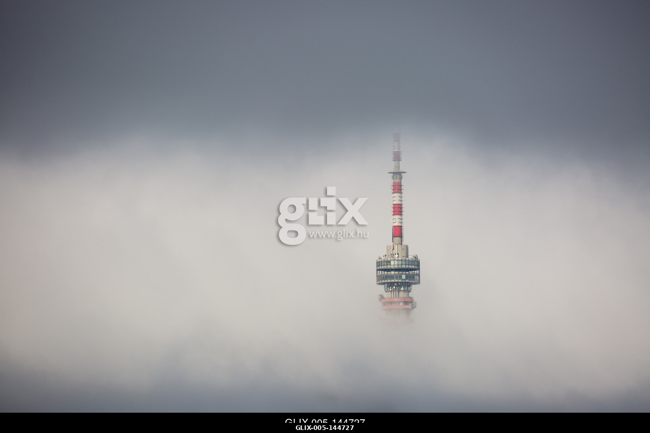 Telecommunication Tower in foggy and cloudy sky.A pécsi Tv-torony és Kilátó Magyarország legmagasabb épülete. A 197 méter magas  épület a Mecsek 53...
