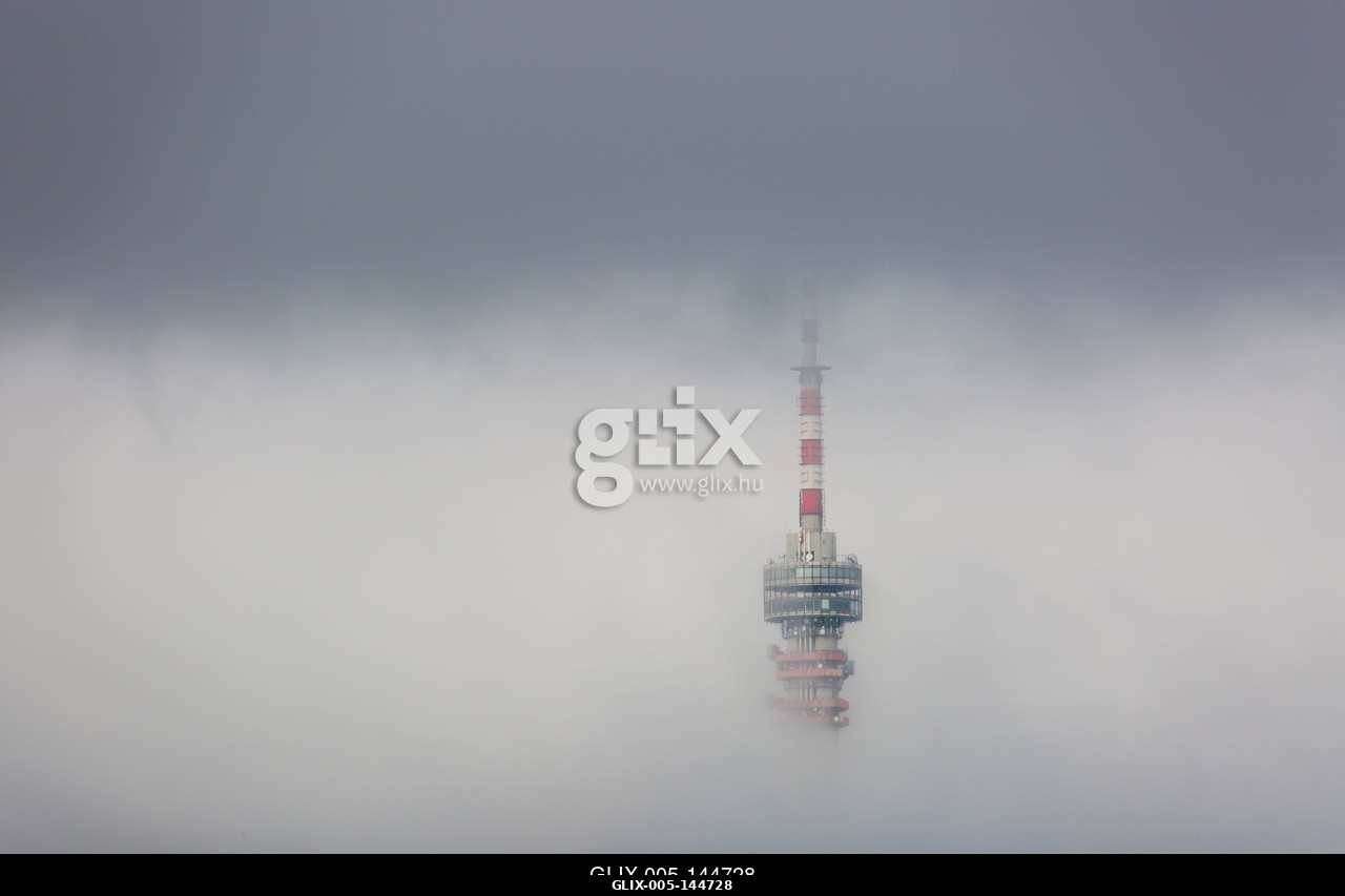 Telecommunication Tower in foggy and cloudy sky.A pécsi Tv-torony és Kilátó Magyarország legmagasabb épülete. A 197 méter magas  épület a Mecsek 53...