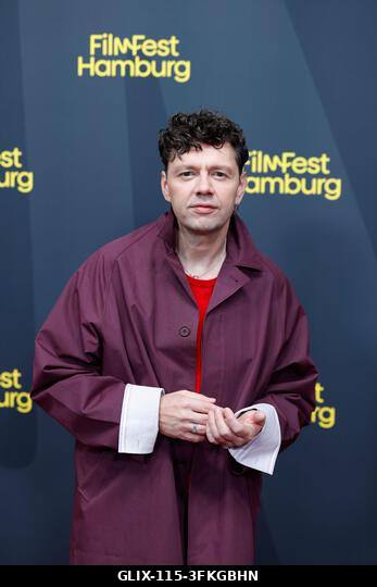 Hamburg, Németország. 2026. szeptember 24. Christian Friedel színész a vörös szőnyegen áll a CinemaxX Dammtor fesztiválon a 34. Hamburgi Filmfeszti...