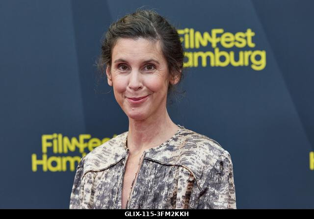 Hamburg, Germany. 26th Sep, 2026. Daniela Dröscher, an author, stands on the red carpet in front of the CinemaxX Dammtor on the occasion of the pre...