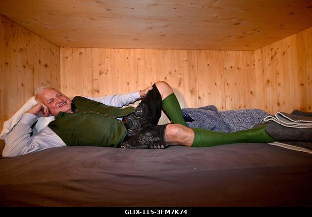Munich, Germany. 27th Sep, 2026. Festival host Christian Schottenhamel is lying in his sleeping box in the Schottenhamel Festival Hall. The 191st O...