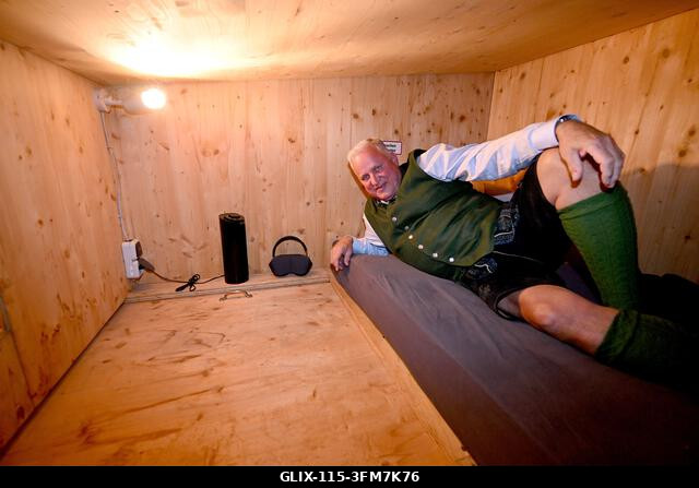 Munich, Germany. 27th Sep, 2026. Festival host Christian Schottenhamel is lying in his sleeping box in the Schottenhamel Festival Hall. The 191st O...