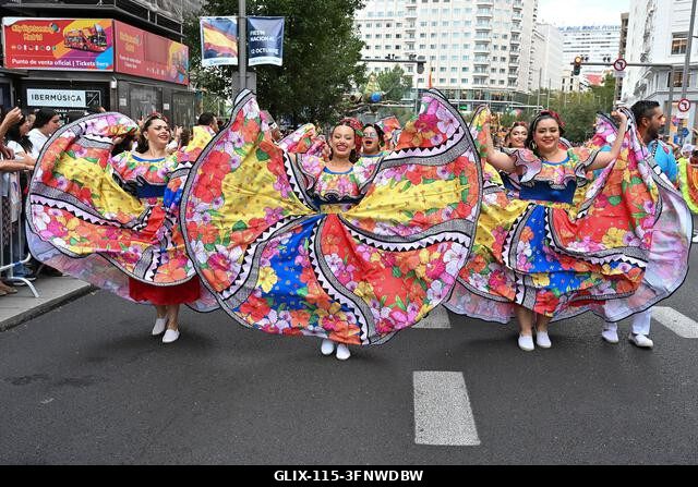 Madrid, Spain. 04th Oct, 2026. Participants in traditional costumes take part in the 2026 Hispanic Day parade on Gran Vía, Madrid. October 4, 2026,...