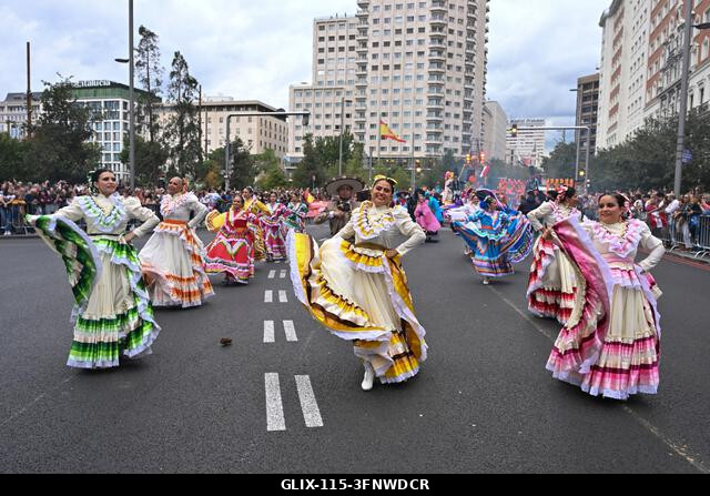Madrid, Spain. 04th Oct, 2026. Participants in traditional costumes take part in the 2026 Hispanic Day parade on Gran Vía, Madrid. October 4, 2026,...