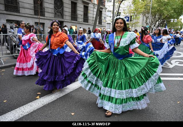 Madrid, Spain. 04th Oct, 2026. Participants in traditional costumes take part in the 2026 Hispanic Day parade on Gran Vía, Madrid. October 4, 2026,...