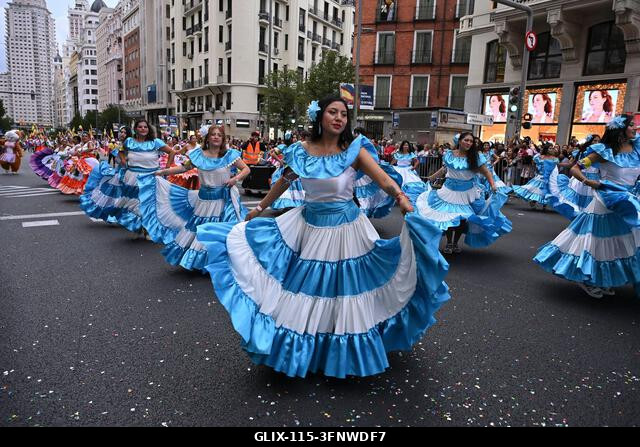 Madrid, Spain. 04th Oct, 2026. Participants in traditional costumes take part in the 2026 Hispanic Day parade on Gran Vía, Madrid. October 4, 2026,...